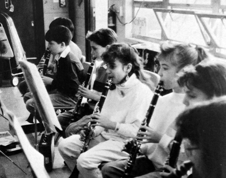 Black and white yearbook photograph of a group of Cherry Run students playing clarinets. 